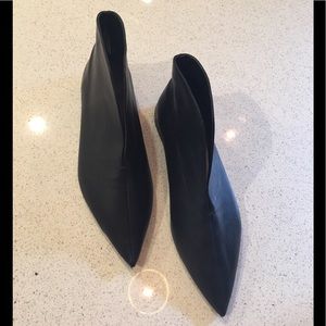 Extra pointy black booties